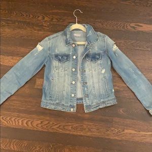 This is a ripped jean jacket